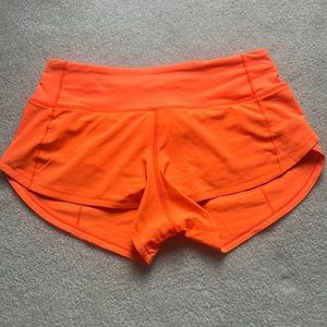 Just like new LuluLemon Size 2 2.5” Highlight Orange Speed Ups